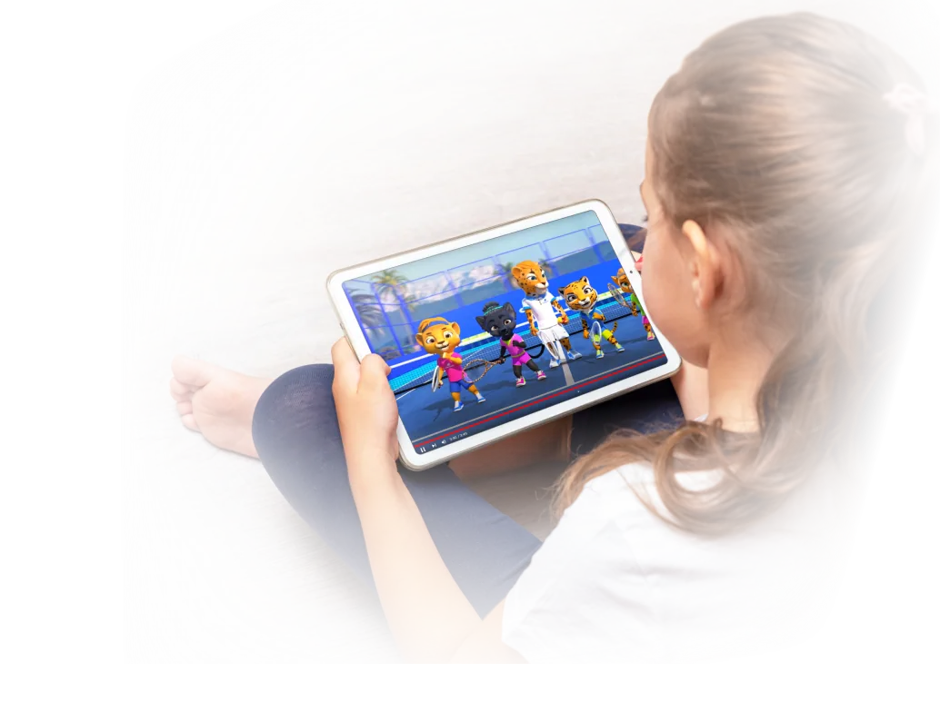 A child watches a COMOOON! lesson on a tablet